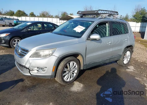 2011 Volkswagen Tiguan Sel z USA, uszkodzony, nr VIN WVGAV7AXXBW539005